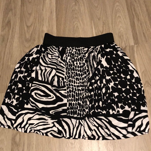 *TWO* skirts. Yellow size 4, black side Small. - Picture 7 of 9